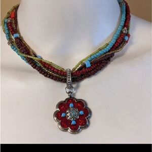 Vintage multi color beaded necklace with flower pendant